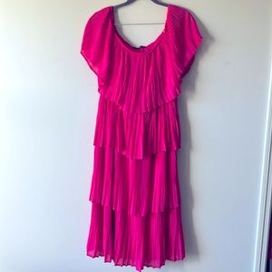 Pink ruffle dress. Optional off-the-shoulder style.